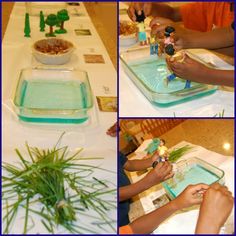 children are doing crafts at a table with green plants and blue trays on it