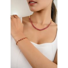 This exquisite choker necklace features a stunning 10.86ctw pear-cut ruby gemstone, radiating a deep, rich red hue. Designed for women with a taste for elegance, the necklace beautifully encircles the neck, making a bold and luxurious statement. Perfect for special occasions, this piece exudes timeless sophistication and grace. Ruby improves mental strength. Designed with a pear cut ruby set in prong settings making a necklace to make you stand out of the crowd. This is a perfect July birthstone necklace, Grandma Gift, Bridal Shower Gift, Mom Gift, Gift For Sister, Mother Daughter Gift, Bride To Be Gift, Bridesmaid Gift, Anniversary Gift, Friendsgiving Gift, Engagement Gift, Wedding Gift, Mother's Day Gift or any Holiday Gift for Mother, Sister, Daughter, Grandma, Fiancé, Girlfriend, Valen Elegant Ruby Choker As A Gift, Elegant Red Choker For Formal Occasions, 14k Gold Choker Necklace, Gemstone Choker Necklace, Sterling Silver Choker Necklace, Sterling Silver Choker, Diamond Choker Necklace, Gemstone Choker, Silver Choker Necklace