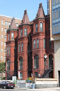 an old red brick building with many windows