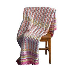 There are only two families in the world who are still practicing this craft. Sujani weaving is a double-cloth technique that creates cotton-filled "puffs" with a wonderfully unique and soft texture. Whether draped over your bed, sofa, or used as a cozy wrap, this blanket is as versatile as it is beautiful.  Our quilts are hand-loomed in the home of our artisans in Gujarat, India. Each quilt takes upwards of 14 hours to make. The family is among the last remaining artisans with the knowledge of Purple Yellow Sunset, Yellow Sunset, Animal Print Party, Stocking Fillers For Him, Knit Loungewear, Cozy Wrap, Stocking Fillers For Her, Pink Sunset, Holiday Party Outfit