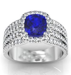 a blue sapphire and diamond ring with the name bla dio written on it