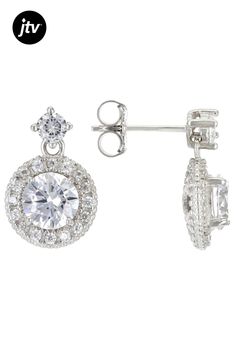 Bella Luce�� white diamond simulant 4.43ctw round, rhodium over sterling silver earrings. Measure approximately 0.56"L x 0.38"W and have pushback backings. The diamond equivalent weight is 2.68ctw. Diamond Simulant, White Diamond, Sterling Silver Earrings, Silver Earrings, Cubic Zirconia, Sterling Silver, Silver, White