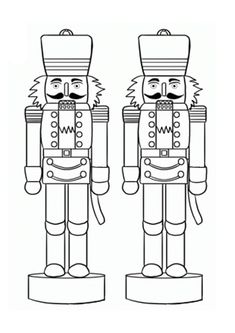 two nutcrackers are standing side by side, one is black and white