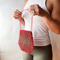 "*Small evening purse with a top zipper and delicate bead straps in vibrant red and green seed beads. *This bag is beaded on BOTH sides.  *Satin lined interior. Functional zipper.  *Hand made in Haiti. *Circa 1990 *Excellent used condition. Note: slight pitting in the bottom of  *Please examine all pictures carefully as they make up part of the description  *FAVORITE my Shop to get notifications about my newest listings or reductions on items you favorite. FREE USPS OR UPS tracked, and insured delivery included.  DIMENSIONS: 7.25' inches Tall 7' inches Wide 7.5' inch handle Drop Measurements are approximate and not exact MISCELLANEOUS: - Do not hesitate to contact me if you have any questions. - All sales are final and are sold in their previously owned/used/\"as is\" condition.  - Packing Handmade Red Shoulder Bag For Parties, Festive Red Pouch Shoulder Bag, Festive Red Handmade Shoulder Bag, Red Evening Bag With Mobile Phone Holder, Red Rectangular Pouch For Festivals, Red Pouch Shoulder Bag For Festivals, Everyday Red Beaded Bags, Red Rectangular Evening Pouch, Handmade Red Pouch