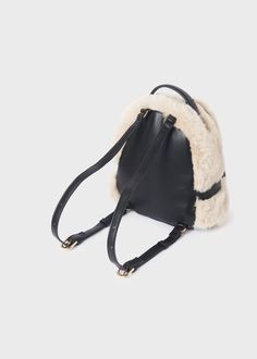 This Abel & Lula Faux Fur Backpack for girls features a stylish outside made of 70% polyester and 30% polyurethane and a cozy 100% polyester lining. Perfect for everyday wear, this backpack adds a touch of luxury to any outfit. Fall Backpack With Adjustable Strap, School Backpack With Adjustable Strap For Fall, Fall School Backpack With Adjustable Strap, Winter Backpack For Daily Use, Trendy Standard Backpack For Fall, Winter Travel Bag With Adjustable Strap, Standard Backpack For School In Fall, Fall Standard Backpack, Fall School Standard Backpack