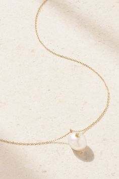 Understated and elegant, Mateo's necklace is the perfect accessory for so many outfits. It's handmade from 14-karat gold and strung with a single pearl that's illuminated by a tiny twinkling diamond. The delicate chain adjusts between three lengths, allowing you to find the ideal drop. White Single Strand Diamond Necklace, Elegant White Necklace With Delicate Chain, Elegant Yellow Gold Pearl Chain Jewelry, Elegant Yellow Gold Bridal Necklace With 17 Jewels, Timeless Single Strand Necklace For Wedding, Timeless Single Strand Wedding Necklace, White Classic Necklace With Delicate Chain, Classic White Necklace With Delicate Chain, Luxury Single Strand 14k Gold Necklace