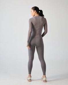 The silky smooth, breathable, and effortlessly sexy layer your warmup has been craving. Searching for a practical styling piece that instantly elevates any active outfit? Look no further. Wear the performance slip with a sports bra and leggings, or over a onesie to achieve that “dancer-core” aesthetic. Sporty 4-way Stretch Activewear With Mesh Back, Gray Fitted Moisture-wicking Activewear, Sporty Workout Leggings With Built-in Bra, Sleek Yoga Activewear With Built-in Bra, Fitted Activewear With Built-in Bra For Pilates, Gray Activewear With Built-in Bra And High Stretch, Gray Compression Activewear With Built-in Bra, Gym Activewear With Built-in Bra And Minimal Stretch, Gray 4-way Stretch Elastane Activewear