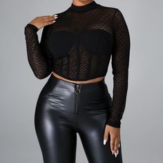 Sexy And Seductive Sheer Top. -Long Sleeve Top -Stretch Material -Mock Neck -Built In Padded Bra -Back Zipper Closure Sheer Fitted Crop Top For Night Out, Sheer Mesh Crop Top For Club, Elegant Black Mesh Top For Club, Sheer Stretch Crop Top For Club, Chic Mesh Tops For Club, Fitted Mesh Crop Top For Evening, Stretch Mesh Crop Top For Night Out, Stretch Cropped Mesh Top For Night Out, Fitted Mesh Top For Club