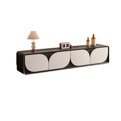 a black and white shelf with two lamps on it