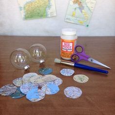 some crafting supplies sitting on top of a wooden table