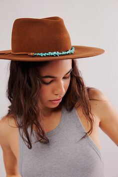 Handmade with love and care, this artisan hat from Lovely Bird is featured in a wide brim style and quality wool fabrication, completed with silk and turquoise stones for an eclectic touch. **Features:** Structured style, wool fabrication, wide brim, dipped crown, silk and suede band, brass and turquoise stones **Why We | Montana Turquoise Wrap Felt Hat by Lovely Bird at Free People in Brown, Size: M Boho Hats For Women, Rancher Hats, Womens Western Hats, Boho Hats, Rancher Hat, Boho Hat, Wedding Hat, Western Hats, Extended Family