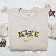 Notre Dame Fighting Irish x Nike Embroidered Shirt, NCAA Sports Embroidered Hoodie, Best Gift Idea Sporty T-shirt With Embroidered Text For College, Sporty Custom Embroidery T-shirt For Streetwear, Sporty T-shirt With Custom Embroidery, Embroidered Tops For College Sports Season, Collegiate Embroidered Tops For College, Sporty Embroidered T-shirt For College, Sporty Embroidered Long Sleeve T-shirt, Sporty Long Sleeve Embroidered T-shirt, Embroidered Crew Neck Top For Sports Events