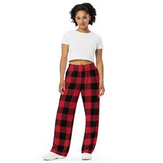 Get the comfort of pajamas in this stylish pair of wide-leg pants. With the adjustable waist and stretchy fabric, it’s like your favorite sweatpants but better. • Relaxed unisex fit • Practical side pockets • Elastic waistband with a white drawstring • Can be worn on the waist or on the hips • Premium knit mid-weight jersey fabric • 95% polyester, 5% elastane (fabric composition may vary by 1%) • Fabric weight: 6.19 oz/yd2 (210 g/m2) (weight may vary by 5%)Size guide WAIST (inches) HIPS (inches) Relaxed Fit Red Wide Leg Pants With Elastic Waistband, Casual Red Pants For Leisure, Red Relaxed Fit Comfortable Bottoms, Comfortable Red Relaxed Fit Bottoms, Comfortable Wide Leg Pants For Pajama Party, Casual Wide-leg Sleep Pants, Comfortable Red Cotton Pants, Casual Wide Leg Pants For Pajama Party, Red Leisure Bottoms With Elastic Waistband