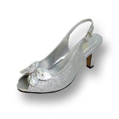 FLORAL Staci women's extra wide width evening dress pump for all your special occasions. This ladies 2.5" mid-heel slingback with a decorative bow and rhinestone jewels on a peep-toe front and all metallic glitter fabric body creates style and look that fits perfectly for those fashion conscious events. Features: Extra Wide Width (E) Synthetic Rubber Sole 2.5" Mid-Heel Slingback with Adjustable Buckle Maximum Traction Rubber Outsole Questions? Contact Us Anytime Wide Width Heels, Church's Shoes, Silver Pumps, Wide Width Shoes, Shoe Display, Star Shoes, Glitter Bow, Glitter Fabric, Silver Shoes