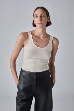 Fine gauge ribbed lightweight cashmere tank with scoop neck and low back. 100% Cashmere Favorite Daughter, Platform Slippers, Sweater Tank, Maternity Shops, Loungewear Shorts, Denim Leggings, Designer Clothes For Men, Modern Outfits, Denim Jumpsuit