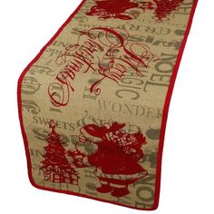 a red and beige christmas runner with santa's sleigh on it