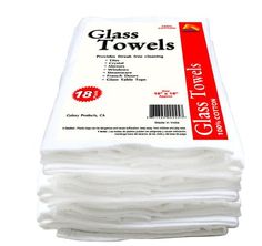 white glass towels stacked on top of each other in a stack with red and white labels