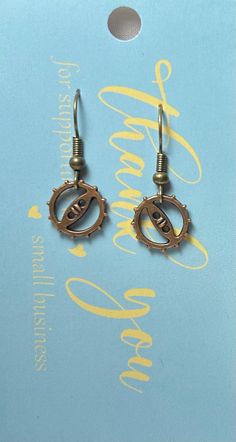 Handmade Gear Earrings with one line down the center Antique Bronze 1.25". They are a perfect Steampunk accessory. Gear Earrings, Steampunk Accessories, Chandler Az, Single Line, Antique Bronze, Halloween Shopping, Jewelry Earrings Dangle, Etsy Earrings, Dangle Drop Earrings