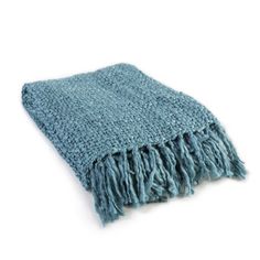 a blue knitted blanket with fringes on the bottom and one end folded up