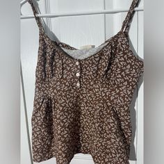 Brandy Melville John Galt - Tank Top - Never Worn - Small Summer Printed Tops For Daywear, Brown Cotton Tops For Daywear, Brown Cotton Vacation Tops, Printed Brown Tops For Vacation, Brown Printed Tops For Vacation, Floral Print Cotton Cami Top, Cotton Floral Print Cami Tops, Fitted Brown Tops For Daywear, Summer Brown Tops With Floral Print