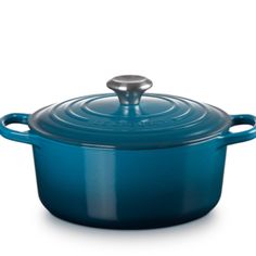 a blue casserole on a white background