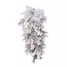 a white and silver christmas wreath hanging from the ceiling with snow flakes on it