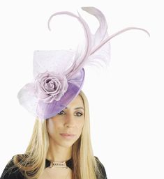 Hats By Cressida Kentucky Derby & Ascot Fascinator Hats Spring Summer Hat & Fascinator Collection Gorgeous long burnt ostrich feather, coque feathers, sparkly tulle trimmed with silk lilac rose Main body about 8 inches wide, bigger with the long wispy feathers Mounted with a matching headband. If you prefer a headband to match your hair, please make a note at check out what colour headband you want. We make each hat to order just for you, we would prefer if you did not order for choice. If colour match is important to you please ask for free fabric swatch to be sent to you - this reduces returns and disappointment.   We can also make a custom design for you if you have something else in mind.  RETURNS: We accept returns ONLY within 7 days of receipt.  There will be no exceptions to this po Mad Hatter Garden, Garden Tea Party, Louise Brooks, Hat Fascinator, Tea Party Wedding, Lilac Roses, Colour Match, Fascinator Hat, Tea Party Garden