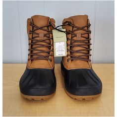 Waterproof Boots New With Tag Original Prize $44.99 Color Brown And Black Size 7 Made In China Waterproof Shoes, Shoes Color, Waterproof Boots, Made In China, Bootie Boots, Black And Brown, Ankle Boots, Size 7, China