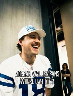 a man in a white and blue football uniform laughing with the caption morgan wallen fans where u at??