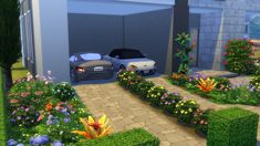 two cars parked next to each other in front of a building with flowers and bushes