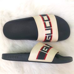 Authentic Gucci Unisex Black White Open Toe Flat Slip On Slide Sandals Brand: Gucci Condition: Good Condition Color: Black White White Gucci Sandals With Branded Insole, Gucci Slide Sandals For Summer, Gucci Summer Slide Sandals, Designer White Gucci Slides, White Designer Gucci Slides, Gucci Luxury Slide Sandals, White Gucci Open Toe Sandals, Gucci Slides For Summer Beach, Designer White Slides For Beach