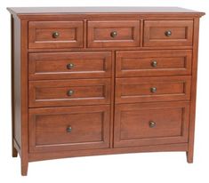 a large wooden dresser with many drawers