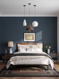 a bedroom with blue walls and white bedding