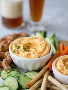 an assortment of appetizers and dips on a plate