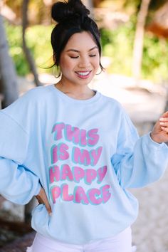 You are going to want to take this sweatshirt to your happy place every time! It's so cute and we love those colors! This sweatshirt is going to look great with white shorts at the beach or over a swimmy! This sweatshirt features long sleeves, a crew neckline, corded fabric, and a cute summery graphic. Material has a generous amount of stretch.Cindy is wearing the small. Blue Graphic