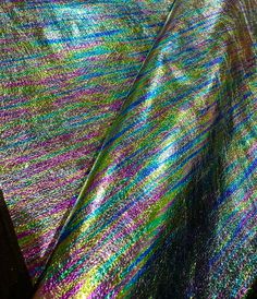 an image of a blanket that looks like it is made out of metallic foil