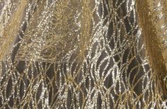 gold and black sequins on fabric