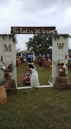 the bride and groom are getting ready to walk down the aisle at their wedding ceremony