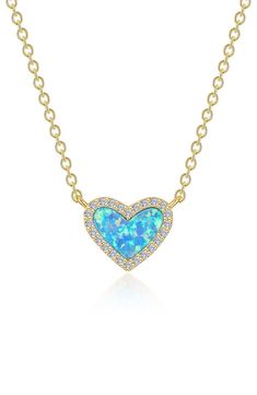 Bring a little sparkle and lustrous romance to any ensemble with this simulated opal heart pendant necklace traced in pavé simulated diamonds. 20" length; 3/8" pendant drop Sterling silver/18k-gold plate/simulated opal/simulated diamond Imported >Diamond Guide Blue Heart Pendant Necklace With Diamond Accents, Elegant Sapphire Necklaces For Valentine's Day, Blue Diamond Heart Necklace, Elegant Blue Heart Necklace With Birthstone, Elegant Blue Birthstone Heart Necklace, Elegant Opal Heart Cut Jewelry, Elegant Heart Cut Opal Jewelry, Formal Sapphire Heart Necklace, Blue Heart Cut Necklace For Formal Occasions