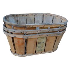 an old wooden basket is shown on a white background