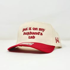 MHC Put it on my Husband's Tab Hats With Sayings, Put It On My Husbands Tab Hat, Sports Events Snapback Hat With Letter Print, Cool Trucker Hats, Trendy Snapback Hat For Sports Events, Trendy Adjustable Snapback Hat For Sports Events, Adjustable Snapback Hat With Letter Print For Baseball Season, Wedding Trucker Hats, Wedding Merch