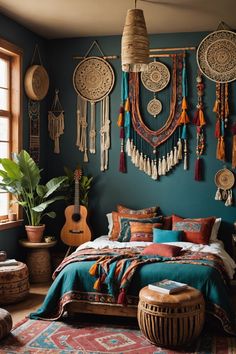 a bedroom with blue walls and lots of hanging decorations on the wall above the bed