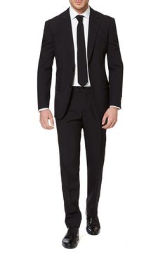 Formal style doesn't have to come with a bank-breaking price tag. OppoSuits pairs a classic, lightweight two-button suit jacket with trousers and a complementary tie in a strikingly clean and simple black color way. Jacket has a two-button closure; notch lapels; nonfunctional four-button cuffs; chest pocket; front flap pockets; side vents. Trousers have a zip fly with button-tab closure; front slant pockets; back welt pockets. Fully lined. 100% polyester. Dry clean or machine wash cold, dry flat Black Tie Men, Black Suit White Shirt, Men Suits Black, Formal Attire For Men, Black Tie Attire, Black And White Suit, Black Suit Men, Attractive Dresses, Black Tie Wedding Guests