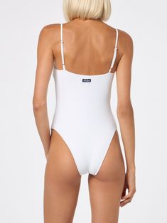 Woman one piece swimsuitTiny strapsSquared neckWhite ribbed colorMultisize fitComposition: 90% polyamide, 10% elastaneCare instructions: Cold hand wash. Do not soak. Do not iron. Do not dry off in contact with other garments. Rinse after contact with chlorine or salt water Chic White Second-skin Swimwear, White Second-skin Swimwear For The Beach, Nylon Swimwear With Square Neck, Square Neck Lined Swimwear With Elastane, Square Neck Lined Swimwear, White Second-skin Swimwear For Summer, Square Neck Nylon Swimwear For Summer, White Tight-fitting Swimwear For Summer, Minimal Stretch White Swimwear For Beach