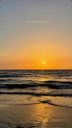 the sun is setting over the ocean with waves