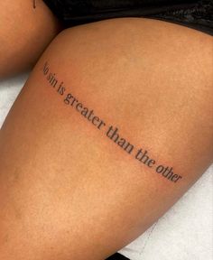 a woman's thigh with the words john is greater than the other