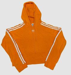 $49 Adidas Women's Orange Solid Pullover Hooded Drawstring Sweatshirt Size XS Description Short design Long sleeves with ribbed cuffs French plush 100% recycled polyester Hood with adjustable drawstring About Us We sell only 100% authentic clothing from new with tags to gently used. We have a 100% authentic or money back guarantee on every item we sell. Items are listed daily so make sure to put us on your favorite! Most of our items come from a nationwide high end dept store. We have been in bu Sporty Orange Hooded Top, Orange Hooded Sporty Top, Orange Cotton Hooded Top, Cotton Hoodie With Three Stripes For Fall, Orange Cotton Hoodie Top, Adidas Cotton Hoodie With Ribbed Cuffs, Adidas Hoodie With Three Stripes For Fall, Adidas Cotton Hoodie With Three Stripes, Adidas Cotton Hoodie With Three Stripes Branding