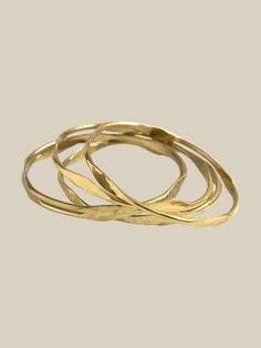 In love with bangles? This textured gold bangle set will be the perfect addition to your collection. Pair with colorful bangles, or keep it classic with more gold colored pieces. Whatever you do, these bangles are sure to become your go-to set. Made from brass-plated recycled metal. Nickel-free. Fits wrists up to 7.75''. set of 5 Heavy Brass Bangle, Colorful Bangles, Half Moon Earrings, Gold Bangle Set, Candle Supplies, Aroma Candle, Brass Bangle, Gold Bangle, Grooming Tools