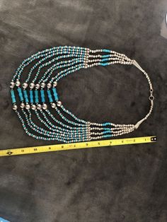 "All of our turquoise has been tested. All are natural color and natural turquoise gemstone. Most have a Mohs hardness of 6 or greater. Museum Quality! Sleeping Blue Turquoise Bench Bead Silver Navajo Old Pawn Pearls Native Handmade Necklace Condition is \"Pre-owned\". Beautiful! Front \"bow tie shaped\" beads are wood all other materials are sterling silver and turquoise. This is obviously hand made by a very talented artist. Sleeping Beauty. It appears to be all original however the hook for t New Braunfels, Sleeping Beauty Turquoise, Vintage Pearls, Natural Turquoise, Handmade Necklace, Turquoise Gemstone, Blue Turquoise, Pearl Pendant, Turquoise Blue