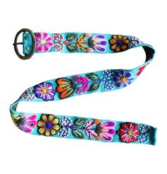 PRICES MAY VARY. COLORFUL BELT: This vibrant colorful embroidered belt features a bold, floral pattern that adds a vibrant touch to any outfit, perfect for pairing with jeans or casual wear. EMBROIDERED BELT: The detailed high quality, multicolor floral embroidery makes this belt stand out, offering a unique and eye-catching style that enhances any casual look. FLORAL DESIGN BELT: With its colorful floral design, this belt is perfect for dressing up or adding a unique touch to everyday outfits. Mexican Embroidered Belt Outfit, Folk Style Multicolor Fabric Belt, Multicolor Fabric Belt In Folk Style, Multicolor Folk Fabric Belt, Folk Style Multicolor Embroidered Belt, Folk Multicolor Embroidered Belt, Multicolor Adjustable Belt For Spring, Adjustable Multicolor Belt For Spring, Adjustable Multicolor Belts For Spring